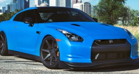 azure blue nissan gtr with 20-inch vossen wheels three quarter front right - featured image