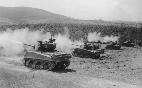 Tanks Sherman M4 in action side view