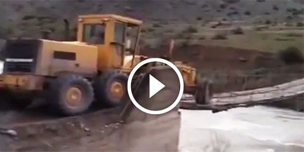 Huge construction Machine on wooden bridge