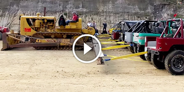 Caterpillar D8 vs 20 Toyotas