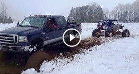 Buggy Pulls Out Mega Truck From Snow Bog