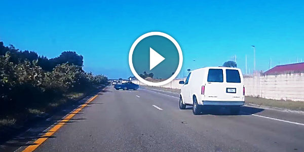 Blue corvette attempts to pass and spins out on freeway