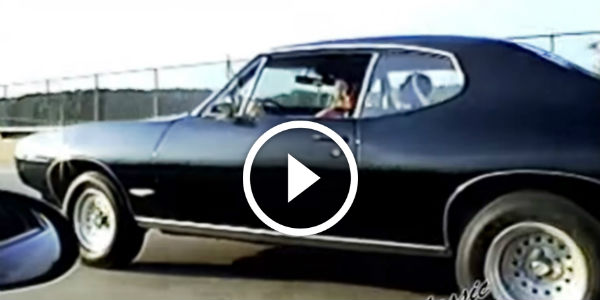 Camaro Z28 messing with 455 GTO on the street