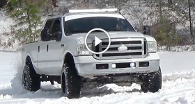 Lifted F250 Powerstroke Playing In The Snow - cl