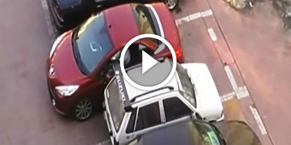 cars fight for a parking spot