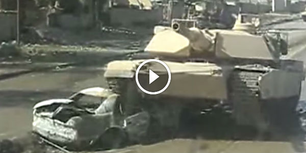 Tank rolls over a bomb