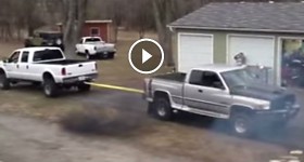 700HP Turbo Cummins VS Ford Powerstroke On Super Swampers Tug-A-War