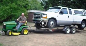 John Deere lawn tractor pulls F350 Dually