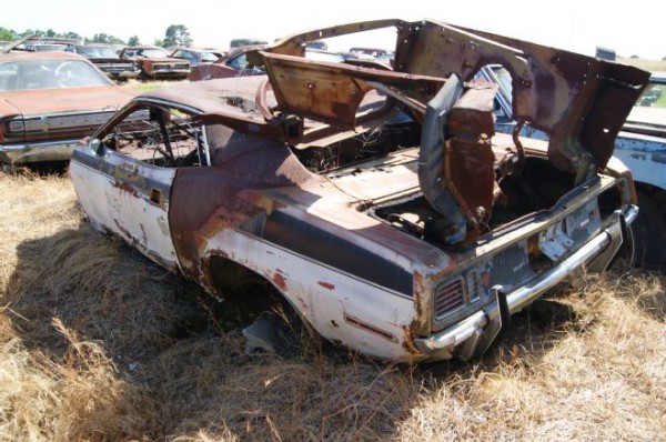 1971-plymouth-barracuda in a junkyard at carolina hills