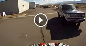 Guy trys to run over Dirtbike rider captured on Gopro