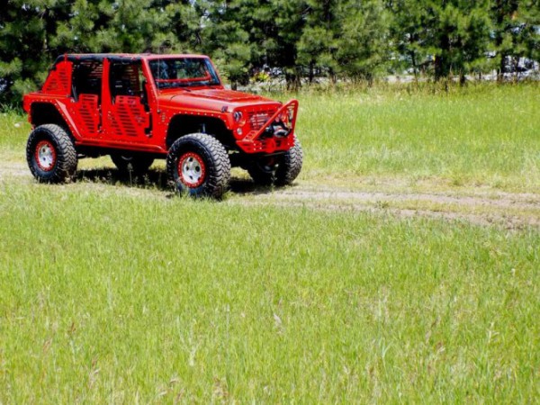 jk skinz jeep with tires front three quarters on the road distant view