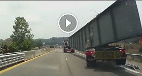 FAIL!! Semi Truck Carrying Huge Steel Beam Tips Over!