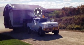 Chevy Cummins moving large house addition up a steep grade!