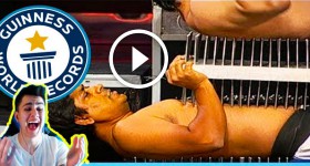TALLEST BED OF NAILS HUMAN TOWER!!! (Guinness World Record Reaction)