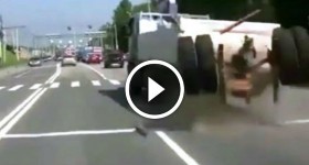 Wheels and rear end fly off a dump truck accident
