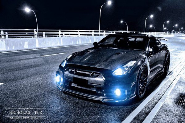 Nicholas TJ.R Wald Black Bison Nissan GT-R parked to a pavement