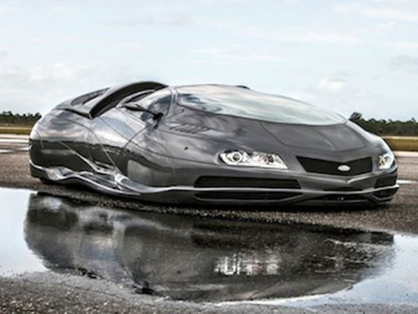 ETV futuristic concept car - front left three quarters near pond