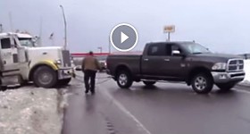 Semi truck Stuck In snow Pulled by Dodge ram pickup (Truck in Ditch )