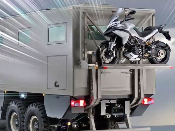 Global XRS 7200 rear end carrying a motorcycle