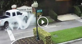 Truck going too fast on wet road loses control