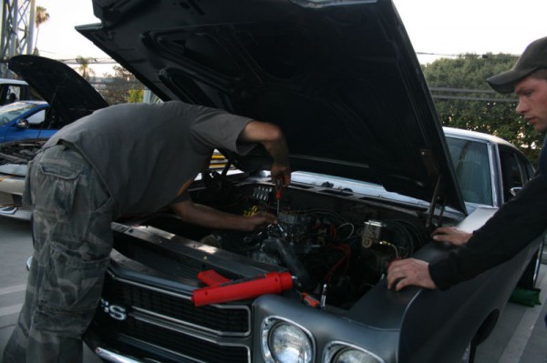 Dom Toretto's 1970 Primer Chevrolet Chevelle SS working under the hood