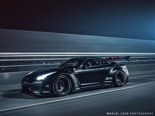 Nissan GTR R35 With Liberty Walk Body Kit front three quarters in motion