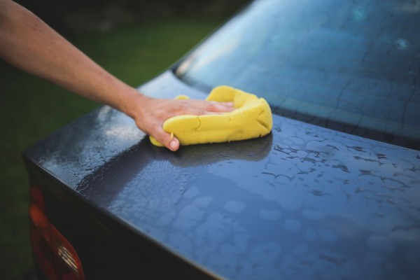 Use a sponge to wash car