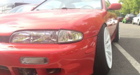 red car headlight close up - cl