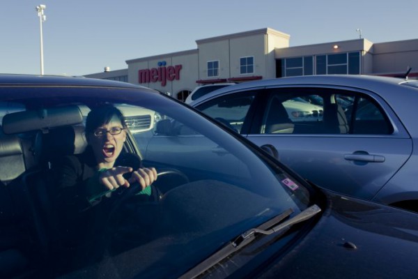 Car parking lot female driver screaming