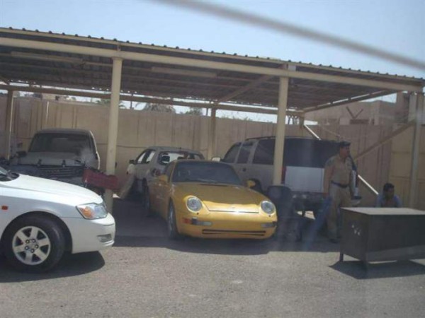 Porsches, a Range Rover, and a Chevrolet Suburban