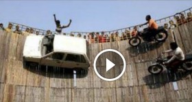 4 cars and 4 bikes riding on a wall