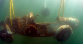 taking out the legendary lake maggiore 1925 bugatti type 22 brescia from underwater - cl