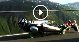 extreme Downhill Rollerman overtaking motorcycle!