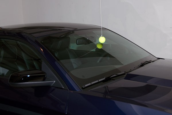 Hang a tennis ball to guide the parking